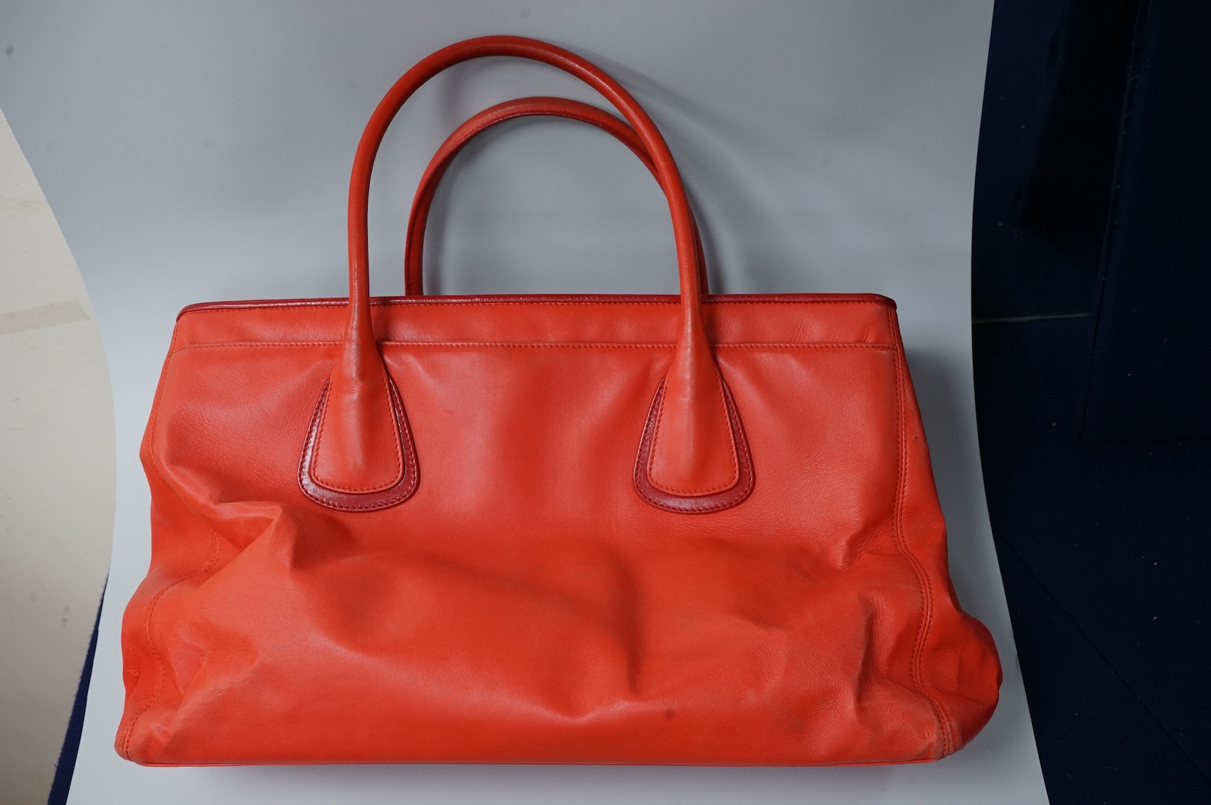 A Chanel red leather Executive Cerf tote bag with silver hardware, with original receipt and dust cover, 41cm wide, Provenance: Purchased by the vendor in Dubai, Chanel
